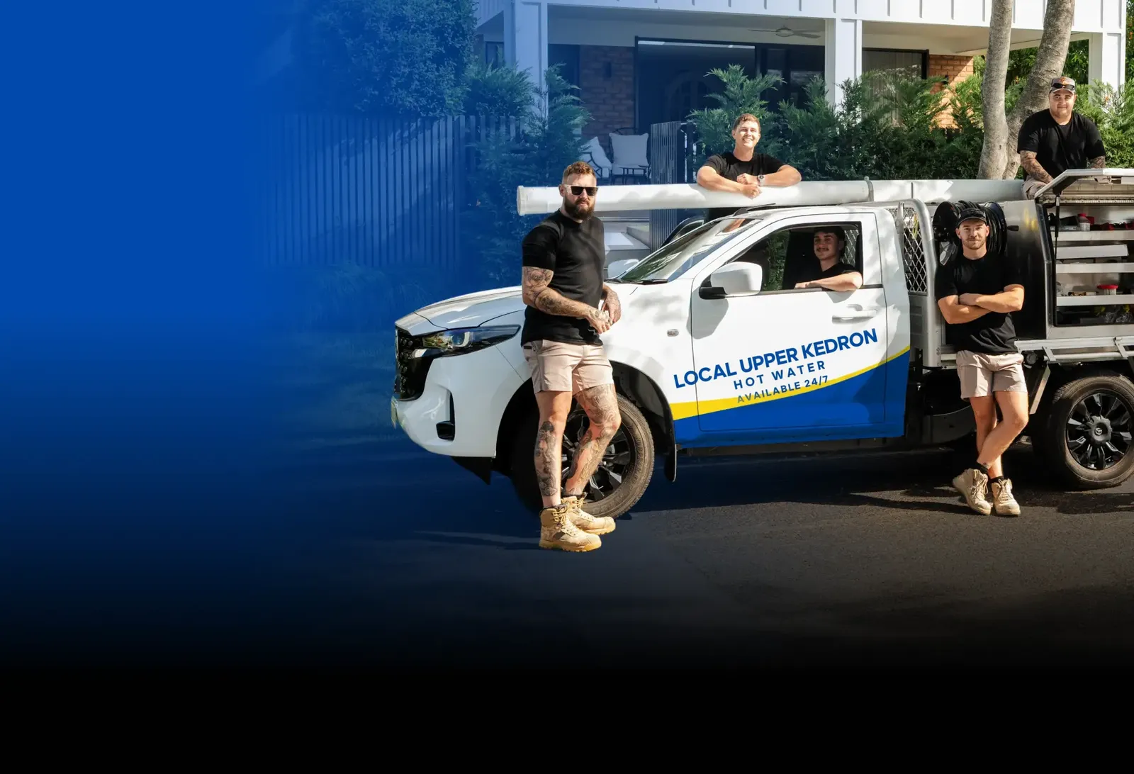 Local Upper Kedron Hot Water team with the ute